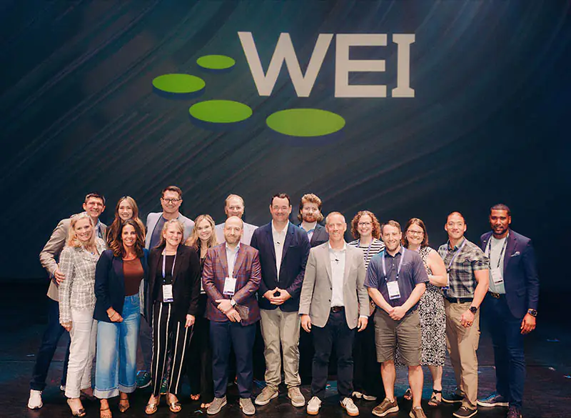 Group photo of WEI accepting the 2026 HPE Partner of the Year Award
